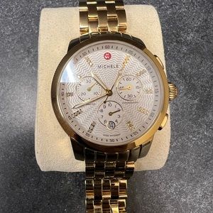 All gold Michele watch with diamonds